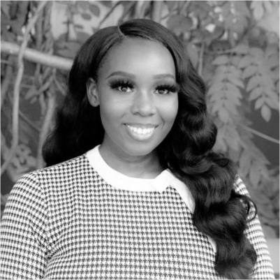 Headshot of Owovolade Shonowo, greyscale