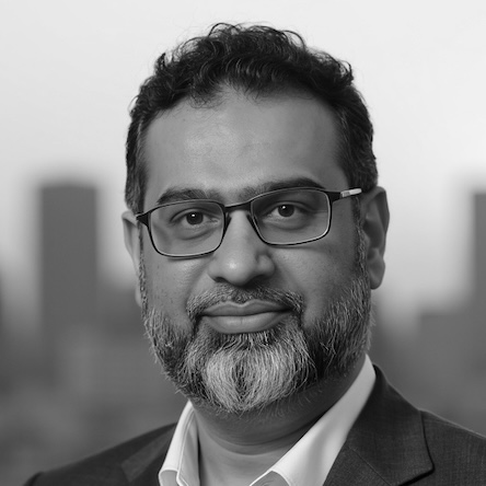 Ahmad Javaid's headshot, greyscale